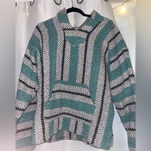 Multi colored drug rug sweater